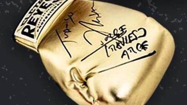 Rifan guante firmado por Chávez y 'Travieso'