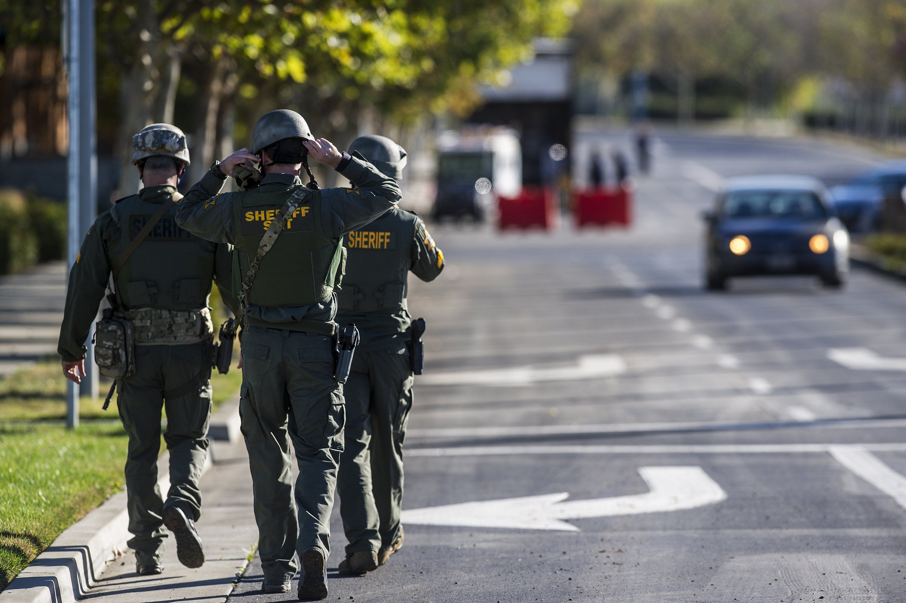Merced County Sheriff SWAT members enter the University of California, Merced campus after a reported stabbing in Merced, Calif., Wednesday, Nov. 4, 2015. An assailant stabbed five people on the rural university campus in central California before police shot and killed him, authorities said Wednesday.  (Andrew Kuhn/Merced Sun-Star via AP)