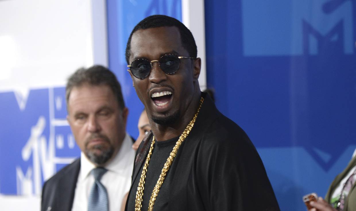 FILE - In this  Aug. 28, 2016, file photo, Sean "Diddy" Combs arrives at the MTV Video Music Awards at Madison Square Garden in New York. On June 12, 2017, Forbes named Combs the top earner its list of the 100 highest paid celebrities. (Photo by Evan Agostini/Invision/AP, File)