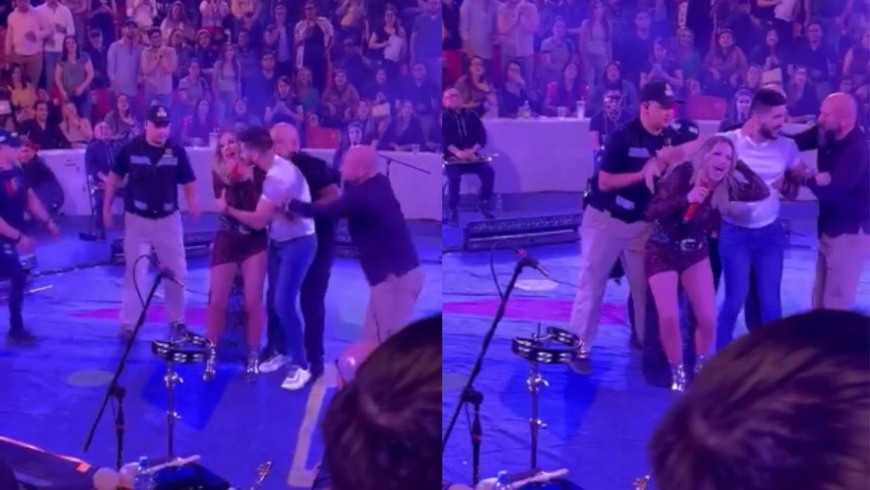 Un hombre irrumpió en el escenario para abrazar y besar a la artista de manera inesperada | Captura de video
