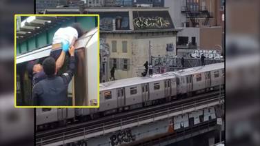 Adolescente de NY arrestado por "surfear" sobre el metro dos días después de que otro niño muriera haciendo el mismo truco viral