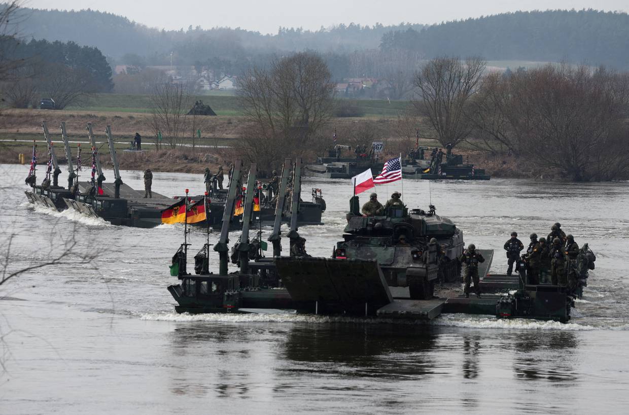 Imagen de archivo de las maniobras militares de la OTAN en Korzeniewo, Polonia | FOTO REUTERS/Kacper Pempel