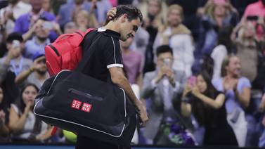 US Open: Federer, dolido de espalda, cae ante Dimitrov