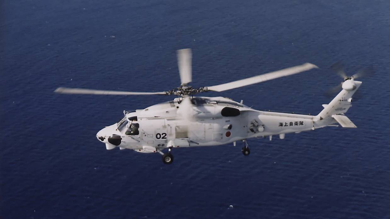 Los helicópteros, dos SH-60K de la Fuerza de Autodefensa Marítima, llevaban a cuatro miembros de la tripulación cada uno. FOTO: Sitio Web de la Fuerza de Autodefensa Marítima de Japón