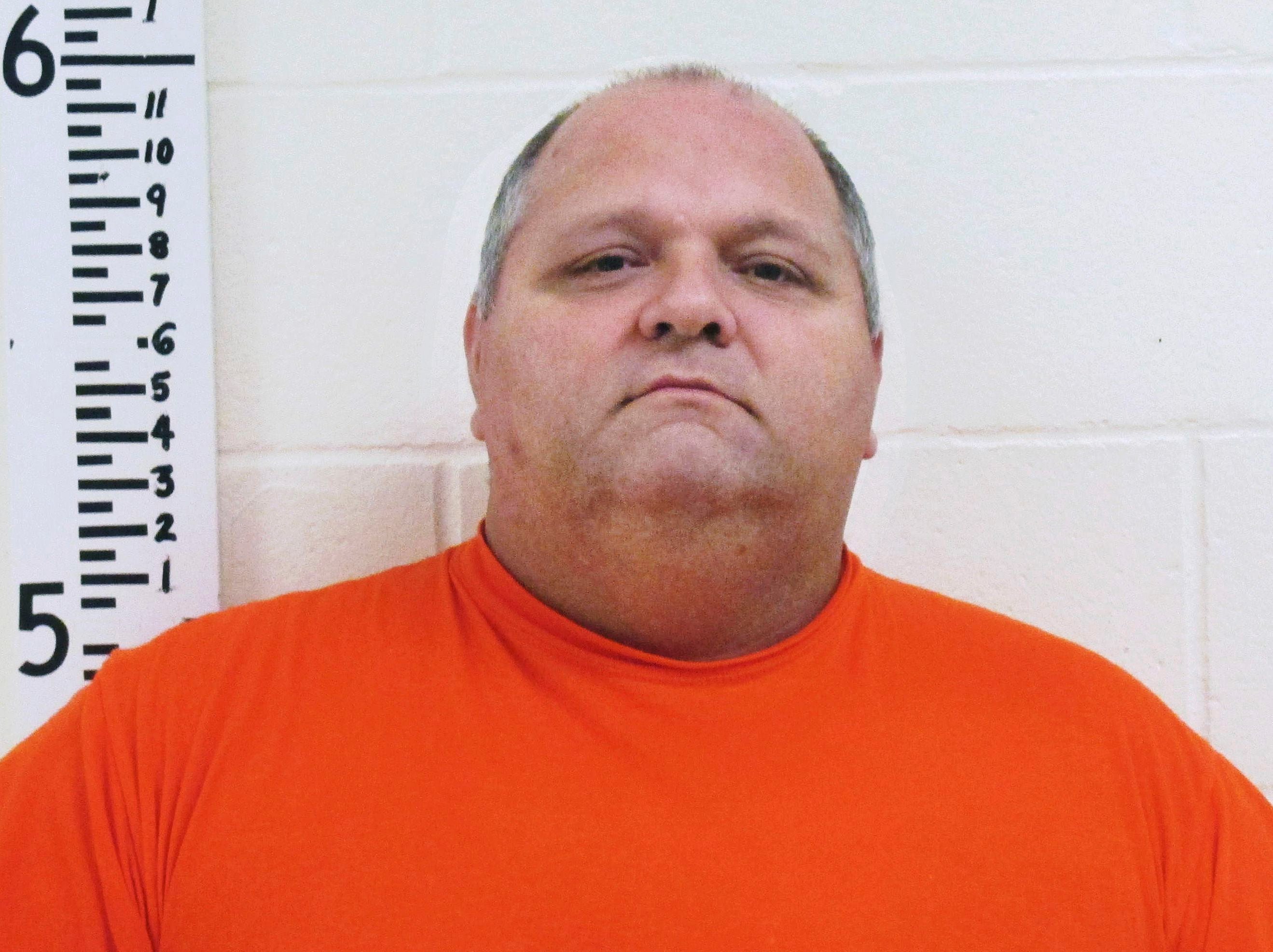 This undated booking photo released by the York County Sheriff's Department shows Michael Middleton, accused of marrying women in multiple states including New Hampshire. Middleton, whose last known address was in Old Orchard Beach, Maine, is due in court for a plea hearing on Monday, April 29, 2019, in Dover, N.H. (York County Sheriff's Department via AP)