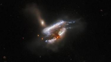 3 galaxias se fusionan en una nueva imagen captada por el telescopio Hubble