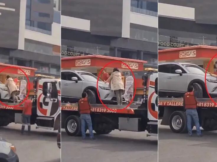 VIDEO: Mujer sube a una grúa para impedir que se llevara su camioneta