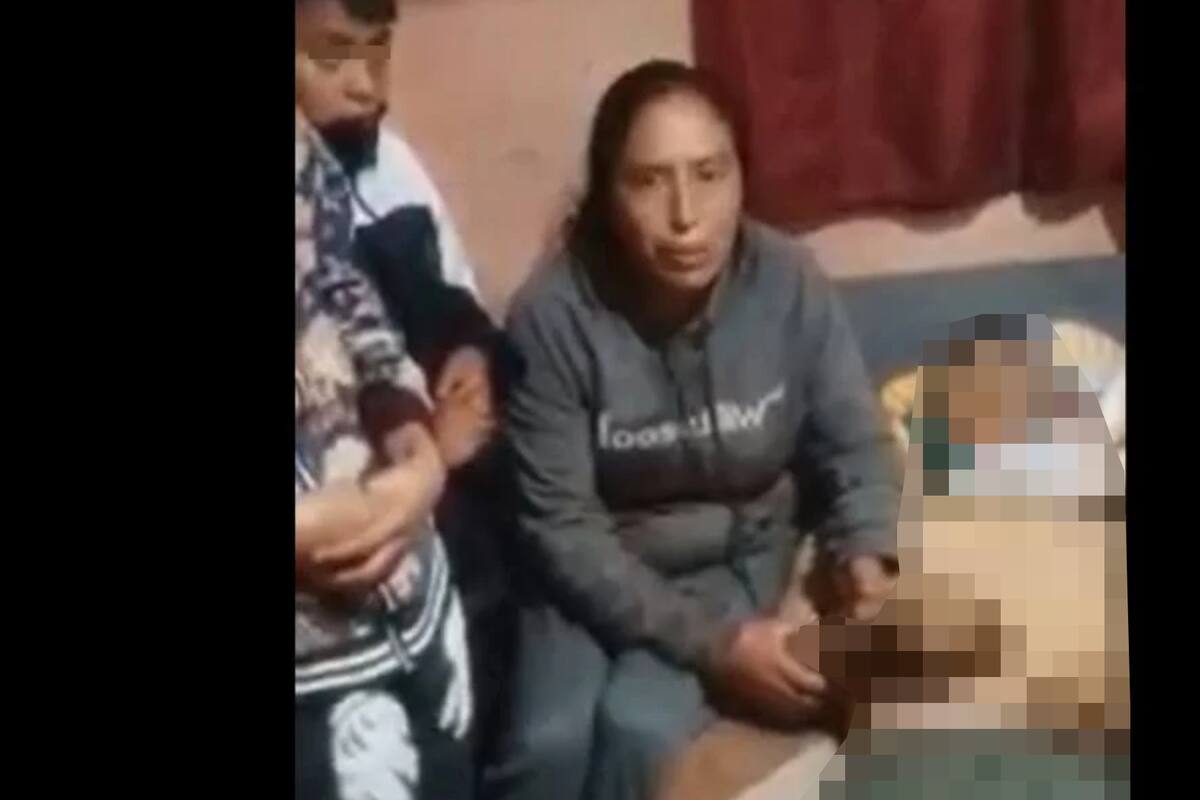 Con cuerpo al lado, mujer denuncia asesinato de su esposo en Michoacán