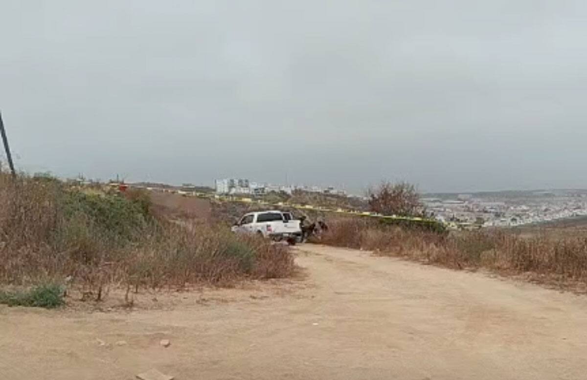 El cadáver se encontraba maniatado y con una soga en el cuello.