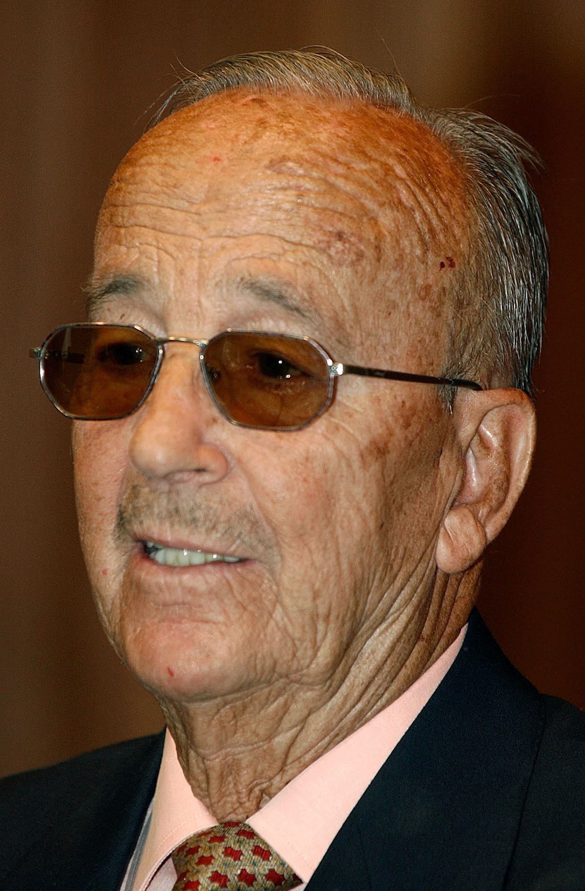 Julio Iglesias Puga, the father of Spanish singer Julio Iglesias, seen in this July 9, 2002 file photo, died Monday Dec. 19, 2005 at the age of 90. The cause of death was not given but Spanish National Radio said it was a heart attack. At 85 Iglesias Puga married 42-year-old Ronna Keit in Florida with whom he had a son, Jaime, in May 2004. Just before his death Iglesias and Keit had told reporters that they were expecting another son, due in 2006. (AP Photo/EFE, Kote Rodrigo) ** LATIN AMERICA, CARIBBEAN AND SPAIN OUT **