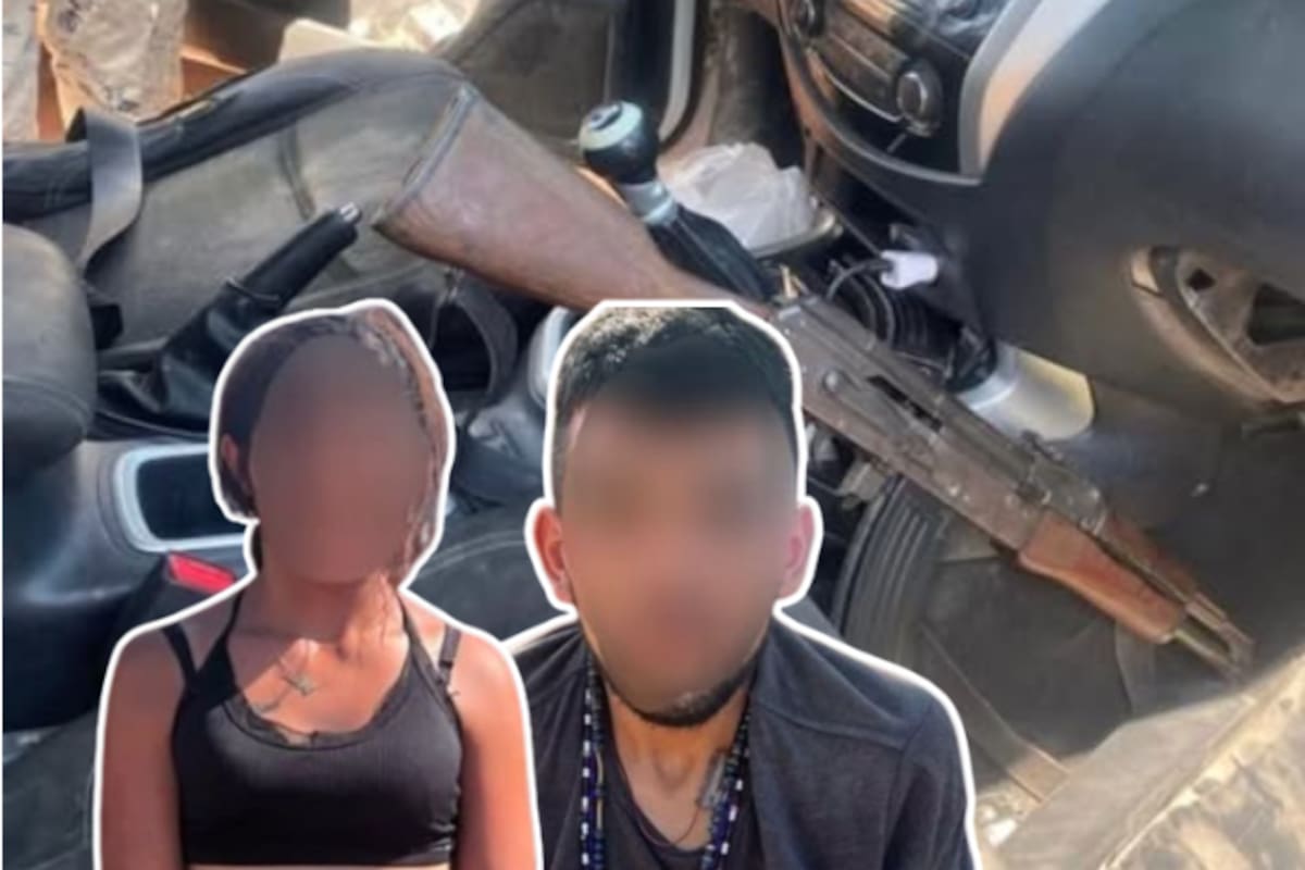 Caen hombre y mujer armados con chaleco táctico y rifle en colonia de Sinaloa