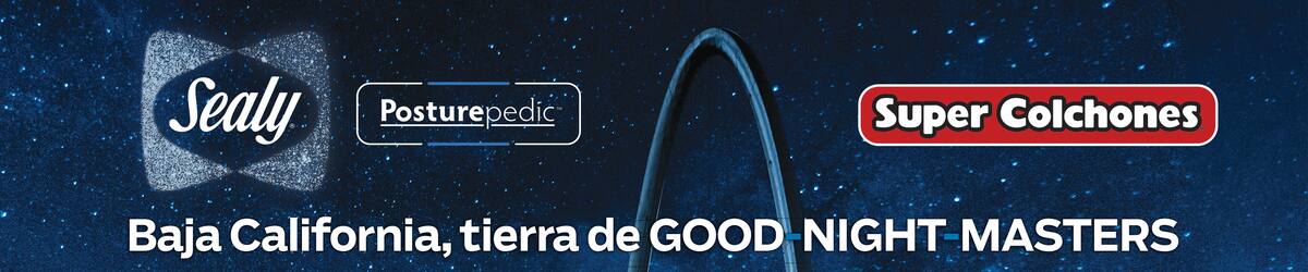 2BRH7R9 Avenida Revolucion (Revolution street) with the millennial arch (el arco y reloj monumental) at dusk. Tijuana, Mexico