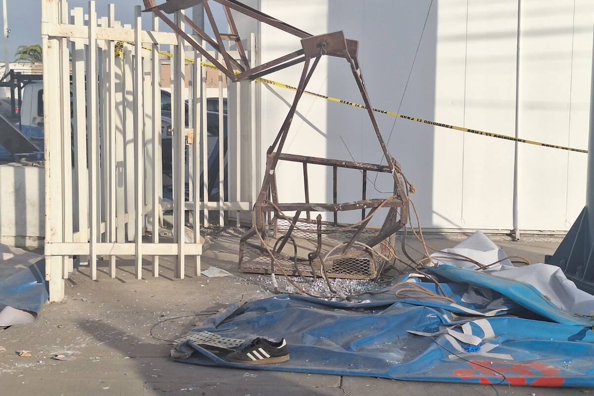 Dos hombres resultan lesionados tras caída desde una canasta metálica