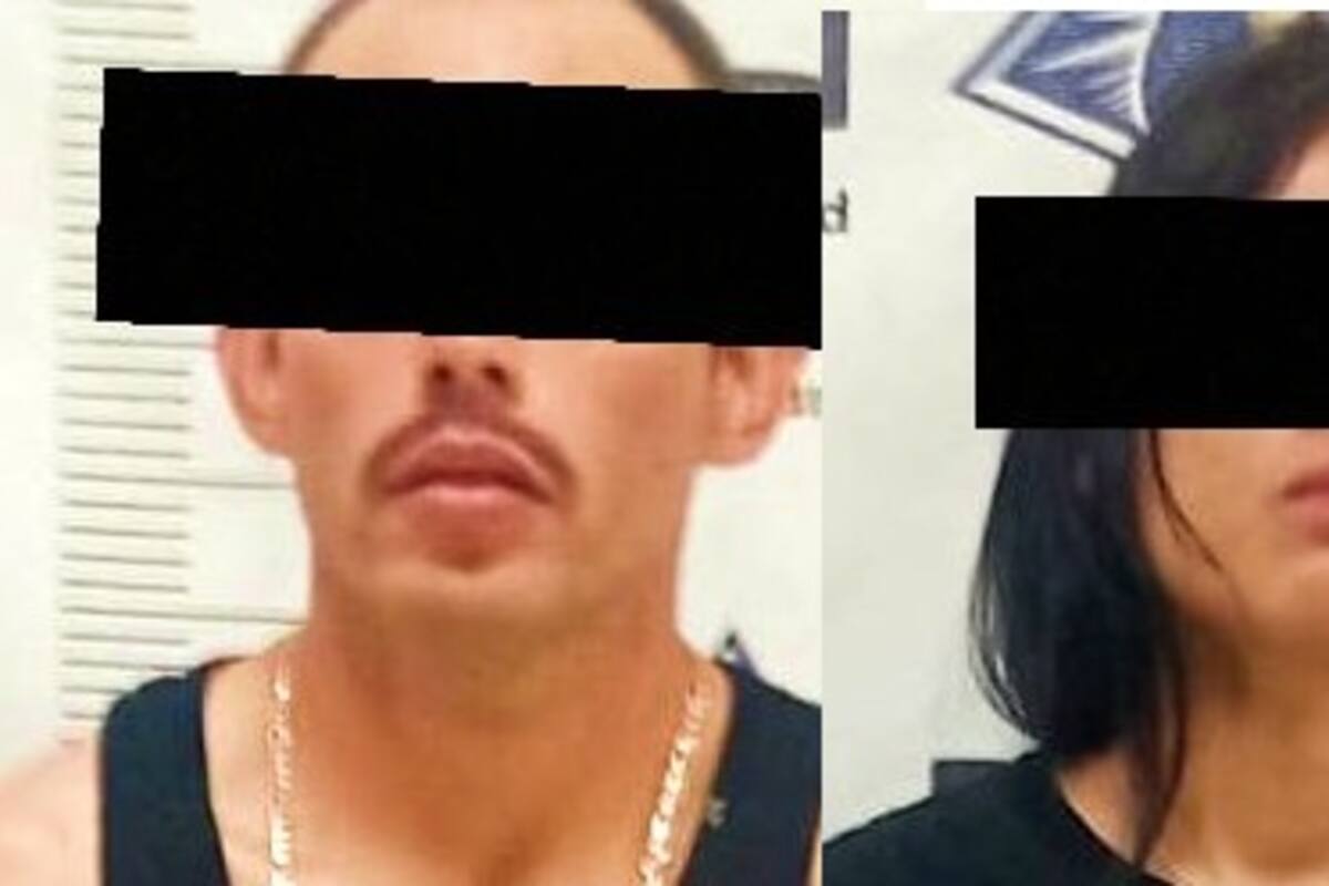 Detienen a pareja por robo a negocio de celulares