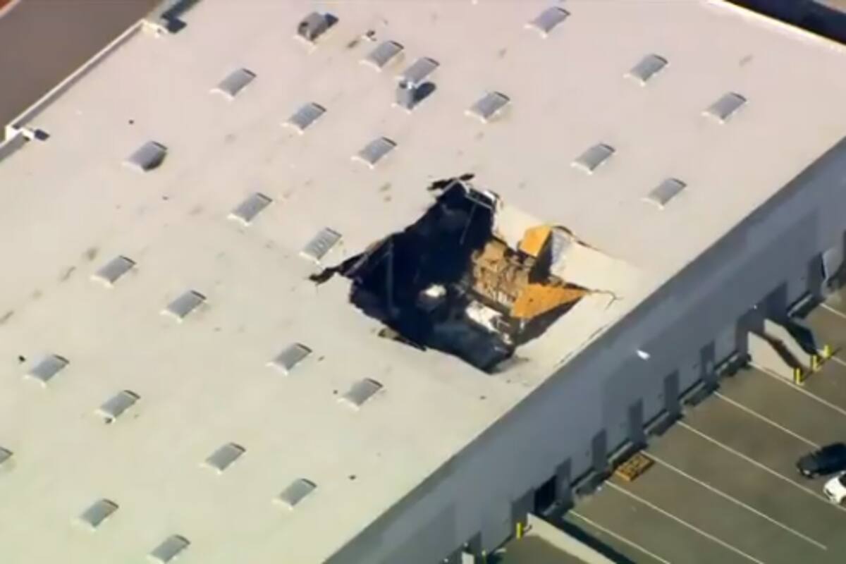 Se estrella avión de combate en almacén de California