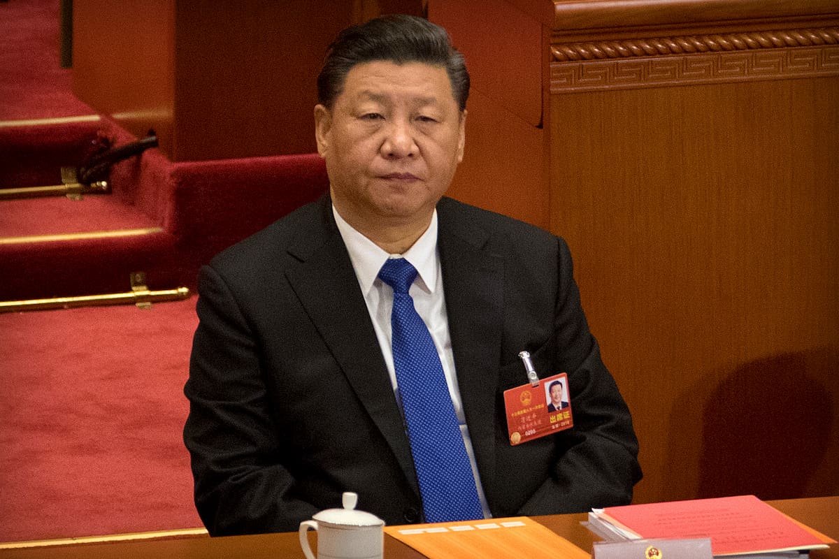Chinese President Xi Jinping attends a plenary meeting of China's National People's Congress (NPC) at the Great Hall of the People in Beijing, Sunday, March 18, 2018. China's ceremonial legislature appointed Premier Li Keqiang, the No. 2 leader of the ruling Communist Party, to a second five-year term Sunday and approved the appointment of a director for a new anti-corruption agency with sweeping powers. (AP Photo/Mark Schiefelbein)
