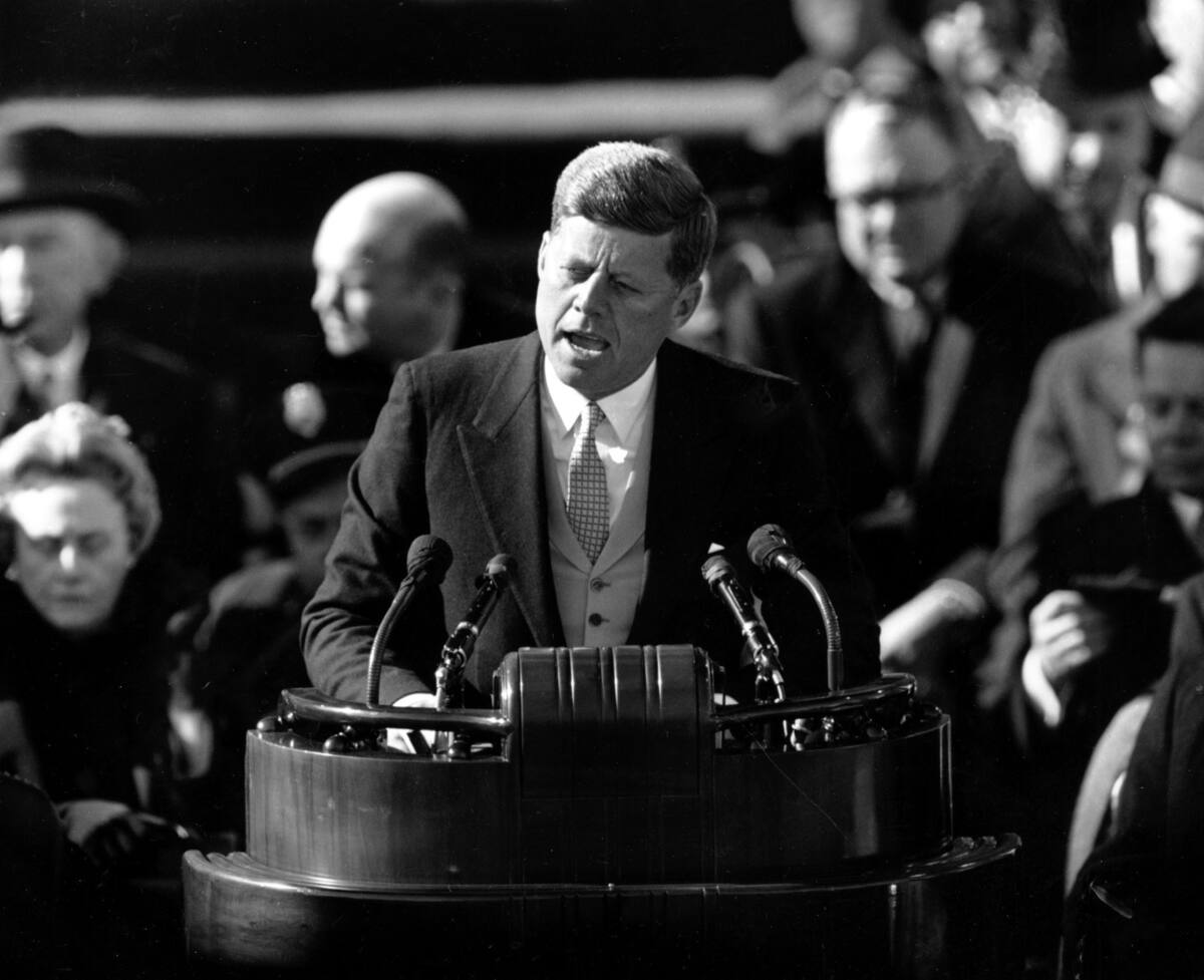 FILE - This Jan. 20, 1961, file photo shows President John F. Kennedy delivering his inaugural address after taking the oath of office, on Capitol Hill in Washington. Donald Trump will be following some giant footsteps when he gives his inaugural speech. (AP Photo, File)