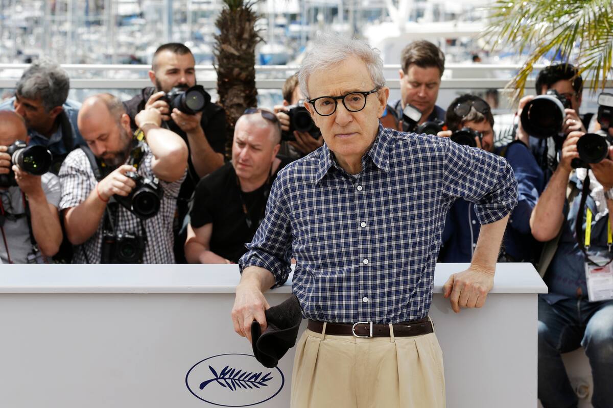 Director Woody Allen poses for photographers during a photo call for the film Irrational Man, at the 68th international film festival, Cannes, southern France, Friday, May 15, 2015. (AP Photo/Lionel Cironneau)