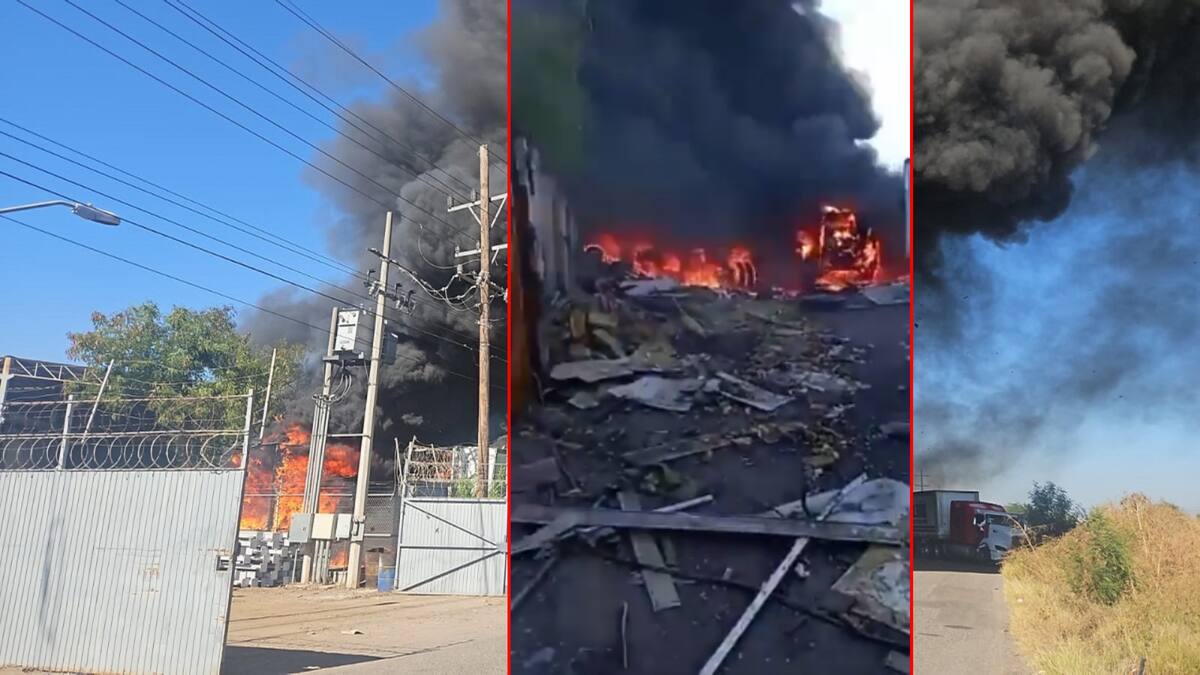 Largas nubes de humo negro, cubren un gran sector, por lo que empleados de la empresa, realizan maniobras para sacar varias cajas de tráiler para evitar que estas sean alcanzadas por el fuego. | Especial GH