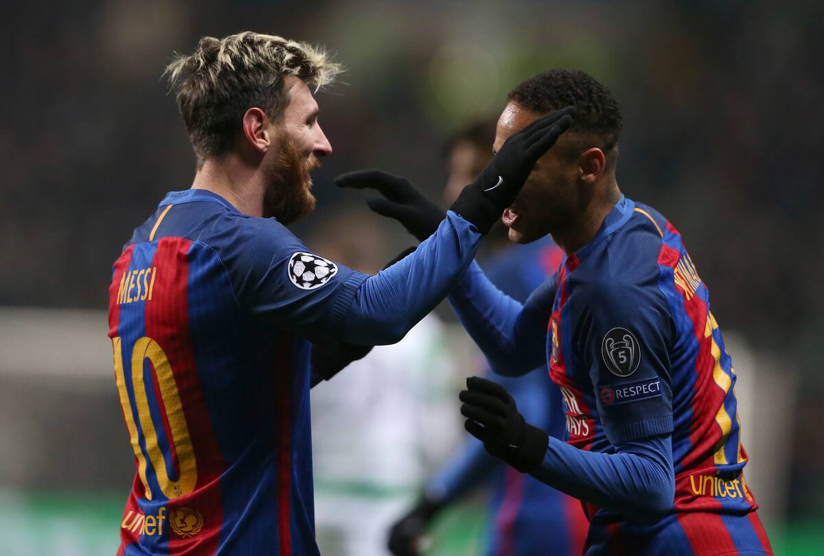 Barcelona's Lionel Messi, left, and Barcelona's Neymar celebrate after scoring during the Champions League Group C soccer match between Celtic and Barcelona at Celtic Park stadium in Glasgow, Scotland, Wednesday, Nov. 23, 2016.(AP Photo/Scott Heppell)