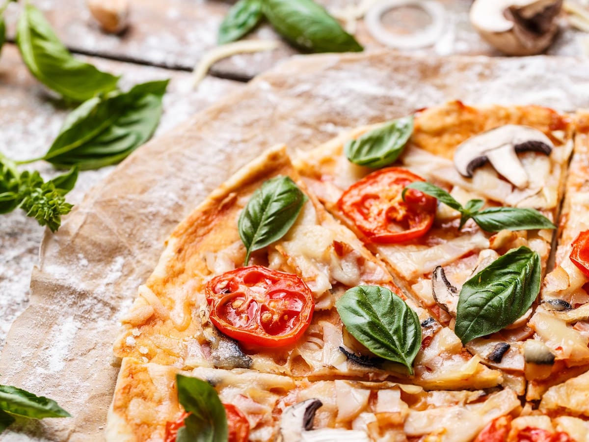La pizza, todo un hit a nivel mundial de la comida italiana. | Canva