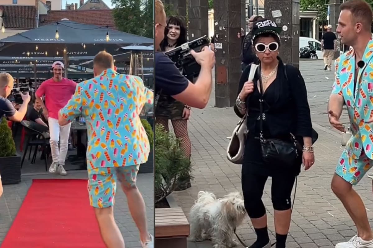 Fotógrafos ponen una alfombra delante de la gente de forma aleatoria para tomarles fotos