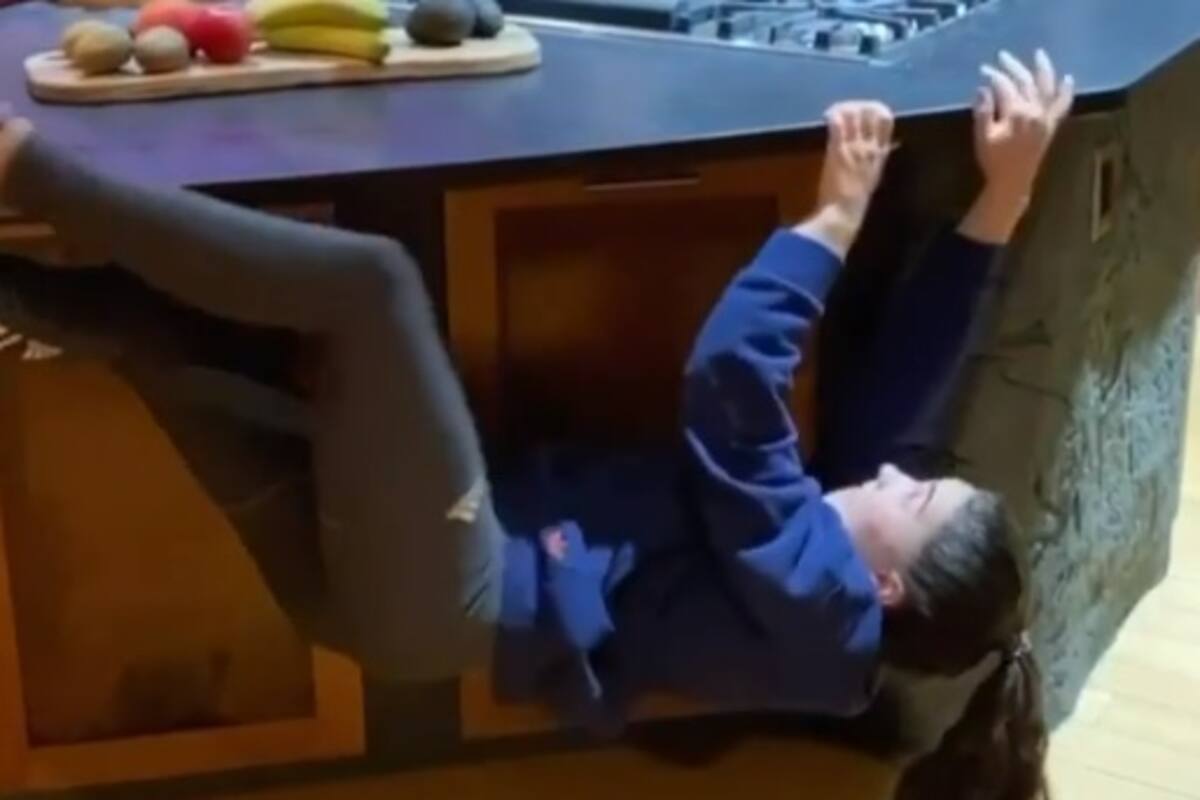 VIDEO: Deportista en cuarentena se graba haciendo escalada por los muebles de la cocina