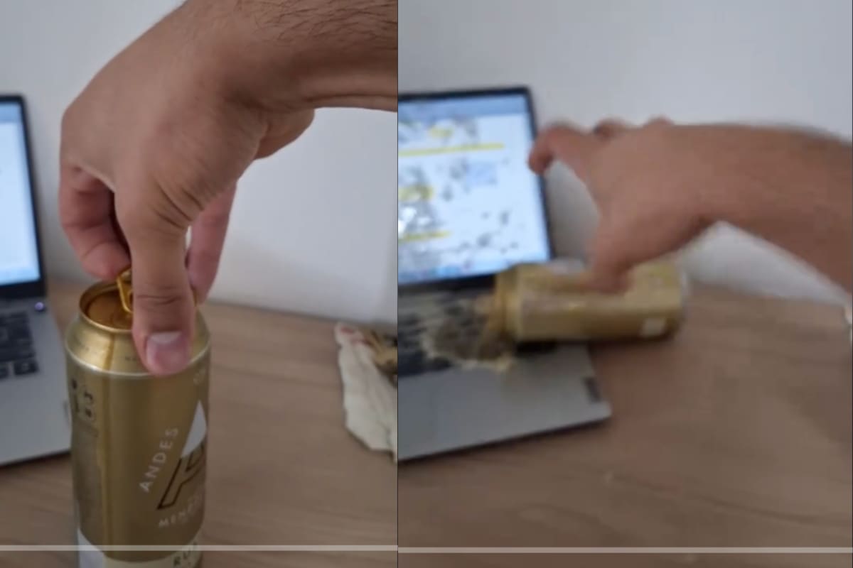 Un trago amargo: joven derrama cerveza sobre su laptop tras larga jornada de estudio