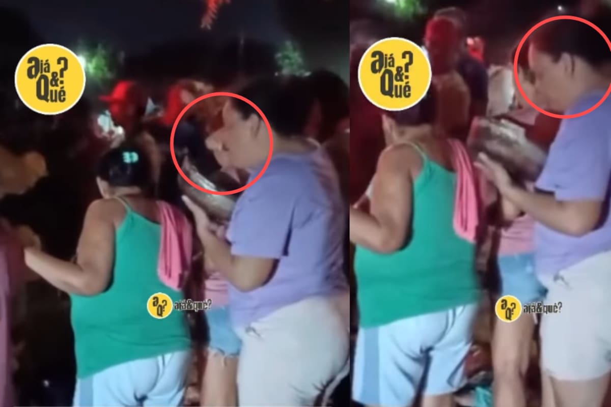 Mujer es captada viendo el chisme pero...salió con todo y sarten en la mano pues estaba cocinando y no quería perderse de nada