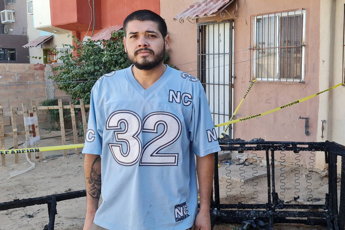 Joven entra a casa en llamas para salvar a una familia