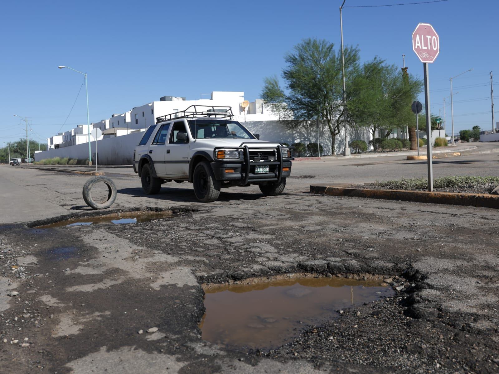 Decenas de calles se vieron afectadas por las lluvias al exponer cientos de baches. (Foto: Javier Gallegos)