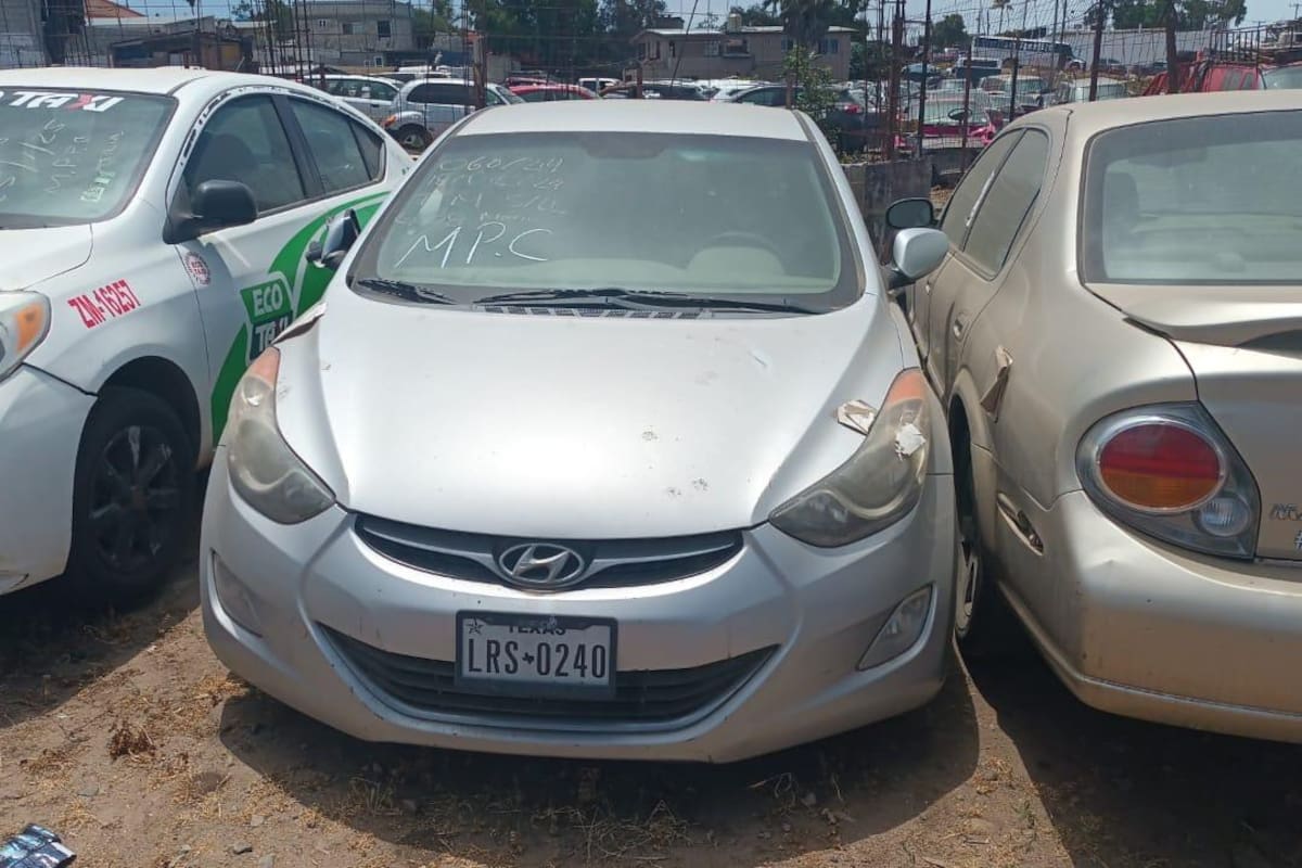 Localizan dos autos robados en corralón en Rosarito