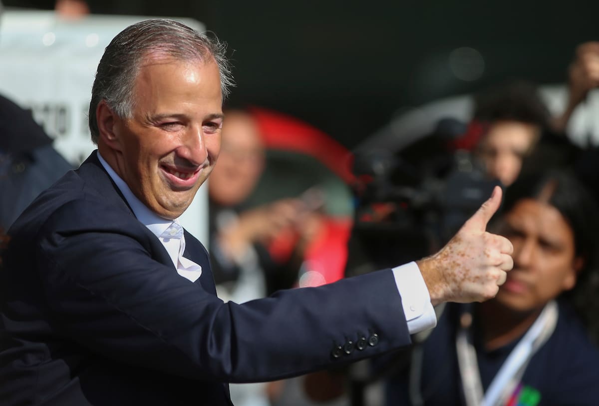 Presidential candidate Jose Antonio Meade, with the Institutional Revolutionary Party (PRI), gives the thumbs up to the press at a polling station during general elections in Mexico City, Sunday, July 1, 2018. Sunday’s elections for posts at every level of government are Mexico’s largest ever and have become a referendum on corruption, graft and other tricks used to divert taxpayer money to officials’ pockets and empty those of the country’s poor. (AP Photo/Anthony Vazquez)