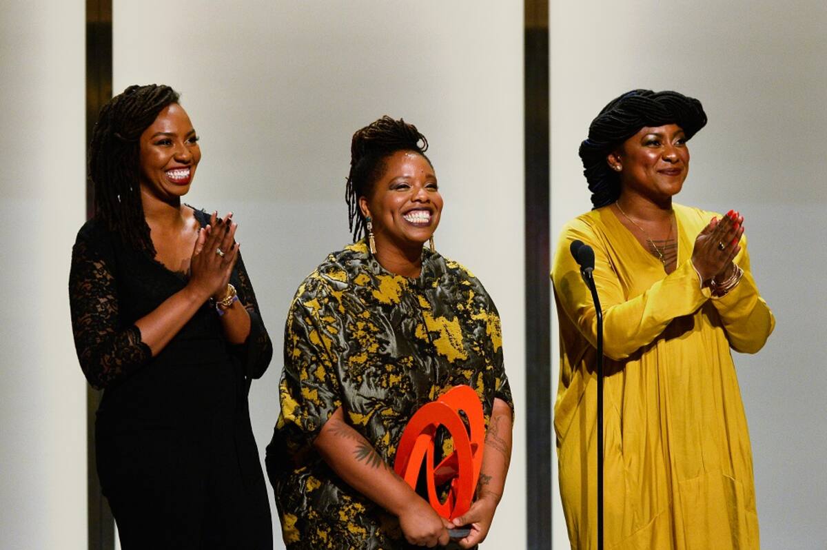 LOS ANGELES, CA - NOVEMBER 14: (L-R) Honorees Opal Tometi, Patrisse Cullors, and Alicia Garza accept an award onstage during Glamour Women Of The Year 2016 at NeueHouse Hollywood on November 14, 2016 in Los Angeles, California. (Photo by Kevork Djansezian/Getty Images for Glamour)
