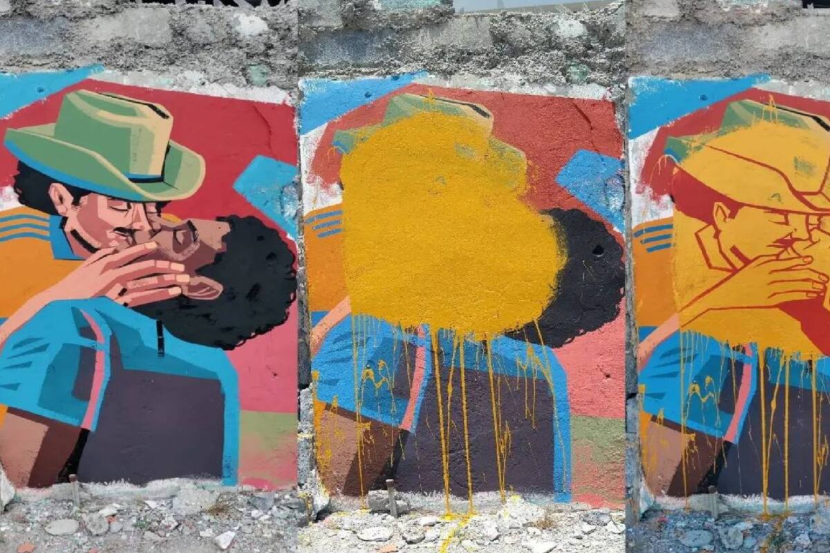 Pinta a dos hombres dándose un beso en las calles de Monterrey, se lo intentan arruinar y lo mejora
