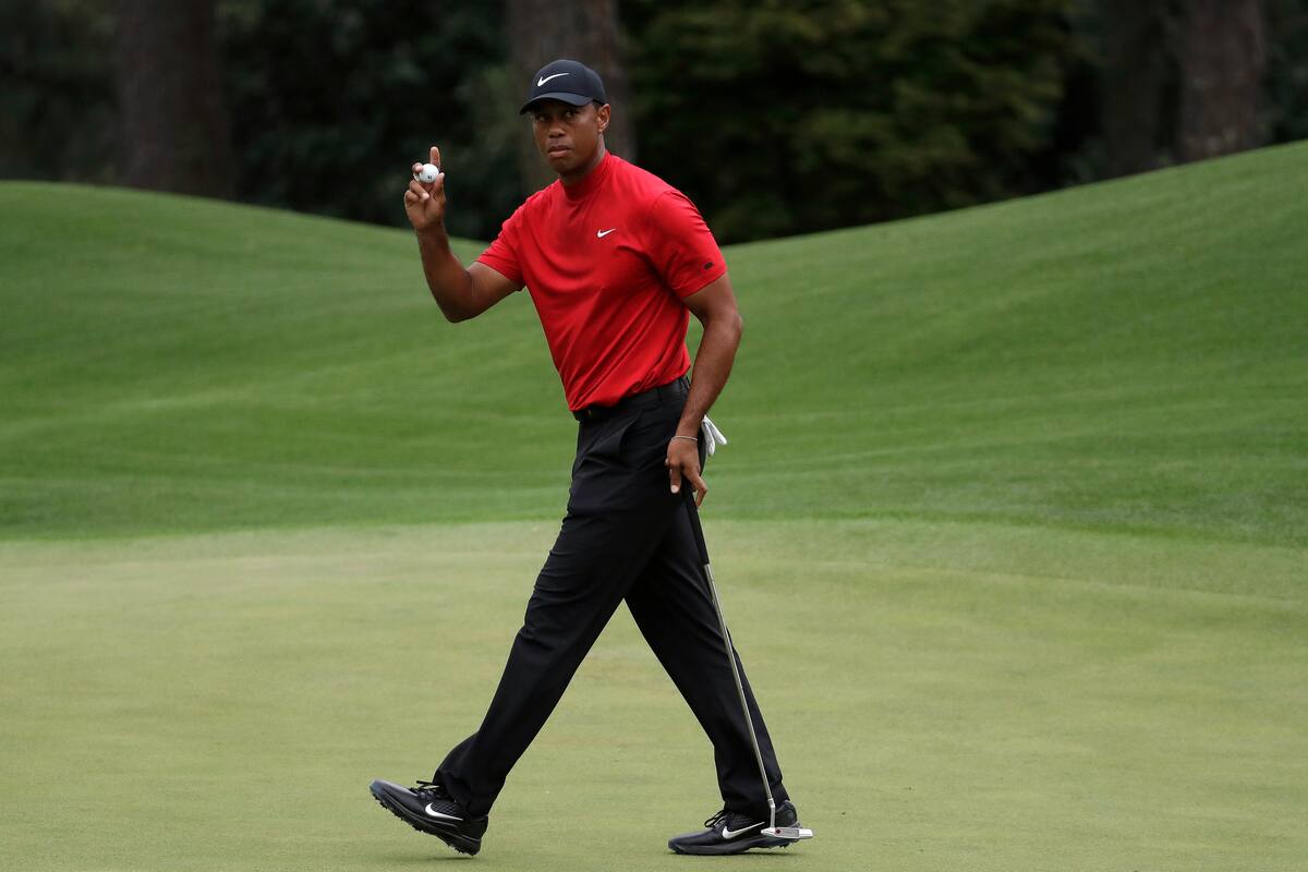 Tiger Woods se opone a Medias Rojas y visita a Trump