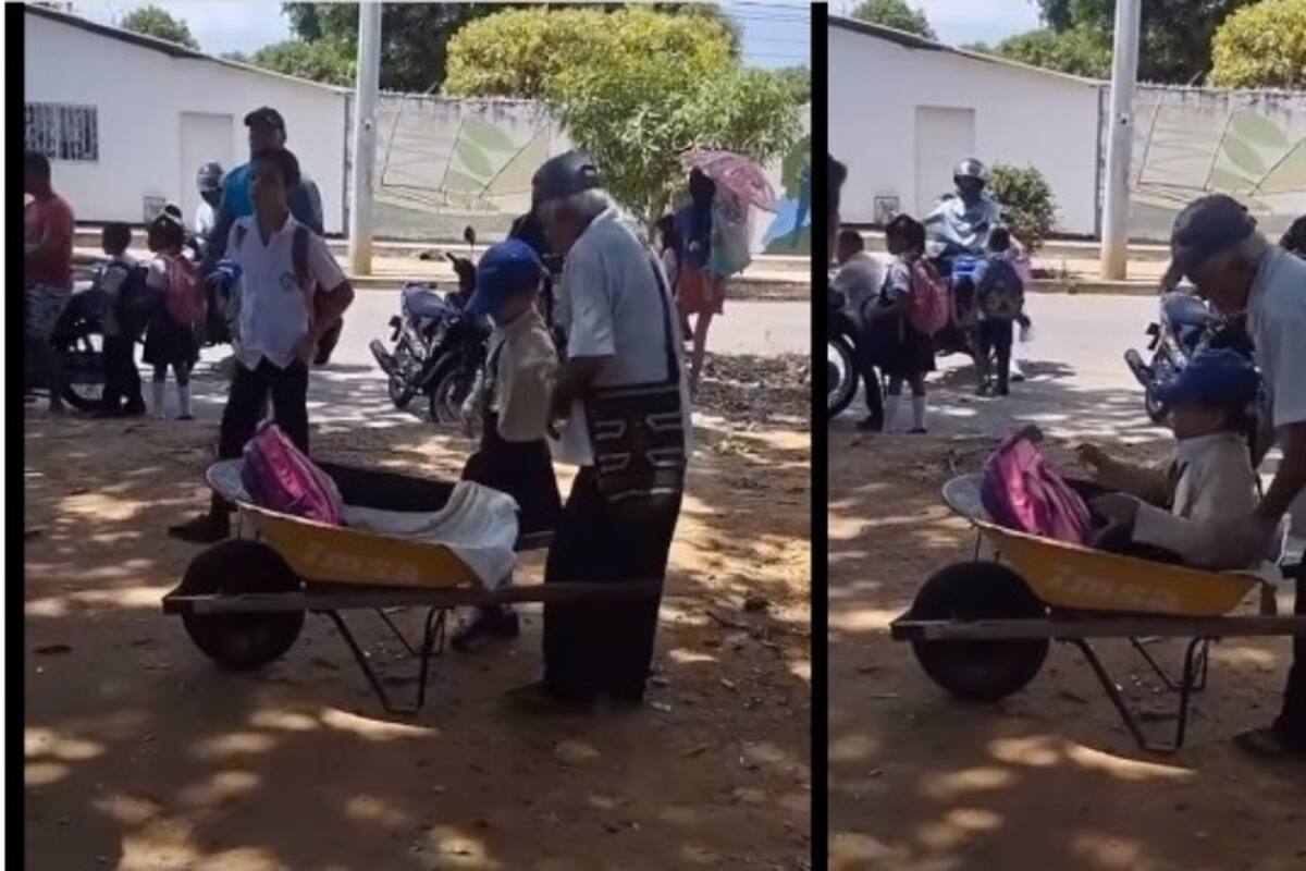 Abuelito va por su nieta a la escuela y la lleva a casa en una carretilla