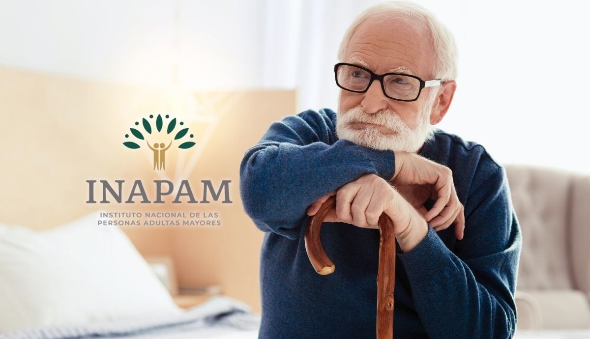 Un adulto mayor reflexiona mientras descansa apoyado en su bastón en una imagen ilustrativa sobre los beneficios del INAPAM. | Canva