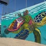 Dual rescata “La Tortuga” un ícono del arte urbano de Rosarito; restaura mural que da identidad a Baja California
