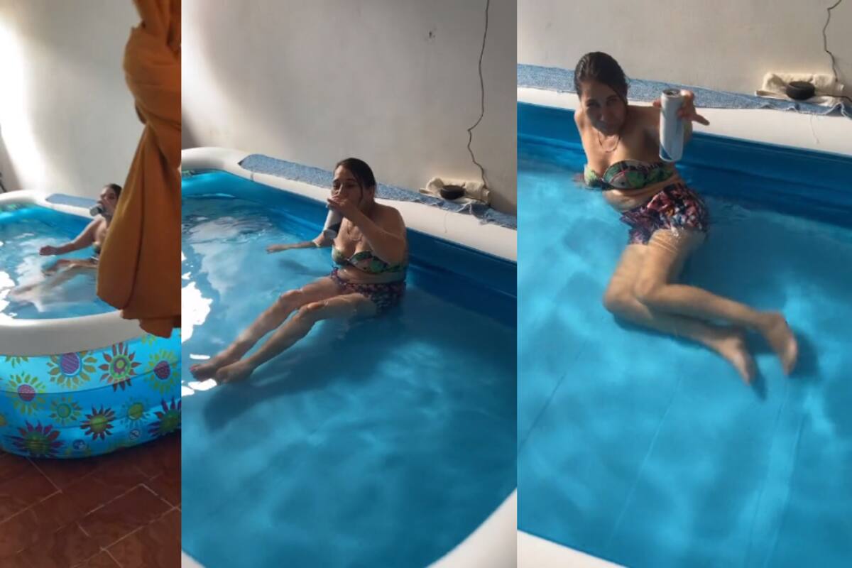Para soportar el calor, esta mujer mete una alberca inflable al interior de su casa | VIDEO