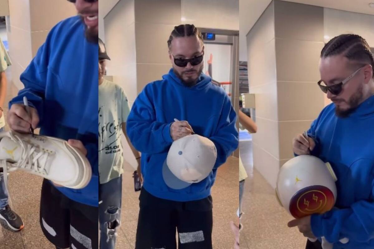 J Balvin complace a sus fans y firma de todo, hasta tenis