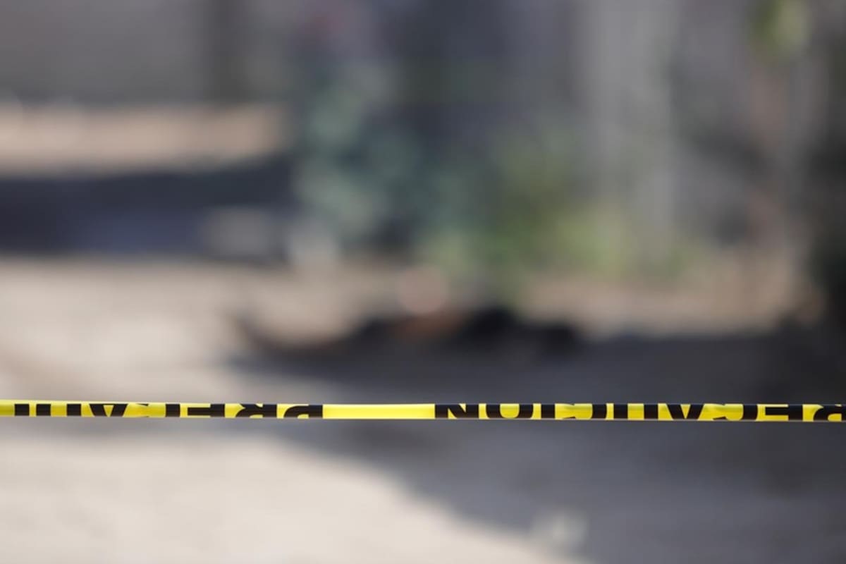 Localizan a hombre calcinado junto a una motocicleta incendiada