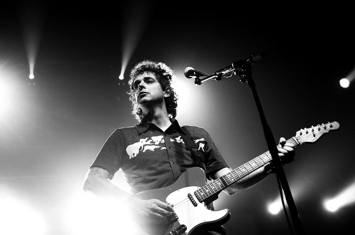 Argentine singer Gustavo Cerati performs during his concert at the Convention Center Atlapa in Panama City, Panama, Tuesday, July 22, 2003. Cerati is on tour for his new album, "Siempre es Hoy." ("It is always today") (AP Photo/Kathryn Cook)