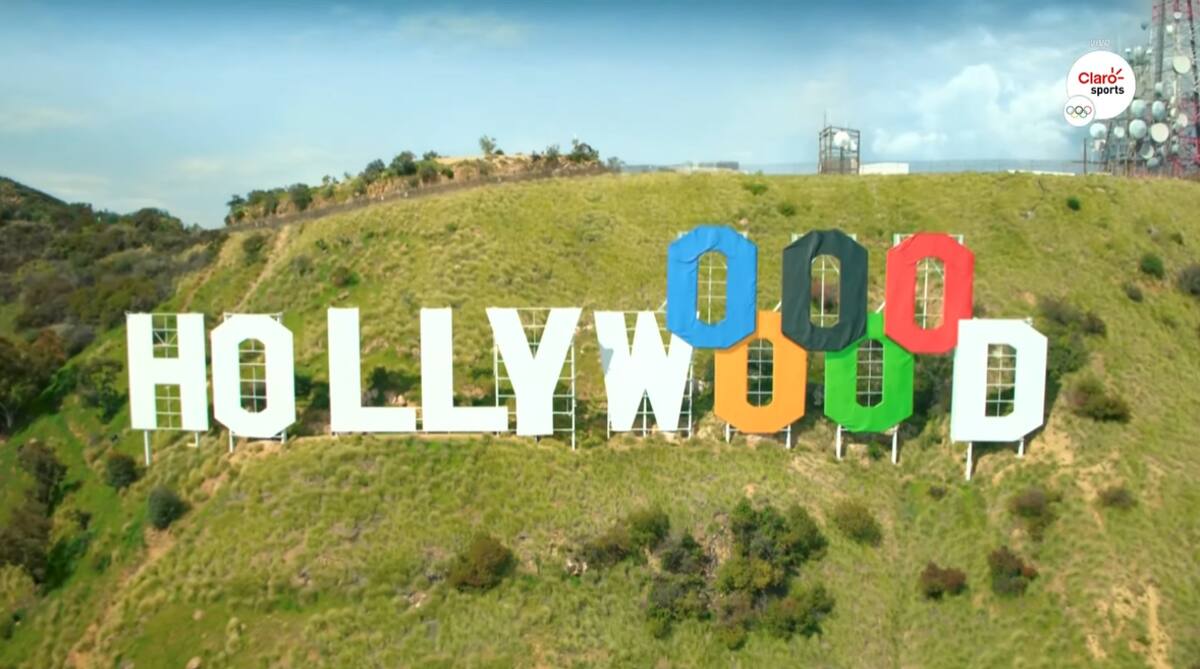 Tom Cruise vistió el letrero de 'Hollywood' con los aros olímpicos / captura @ClaroSports