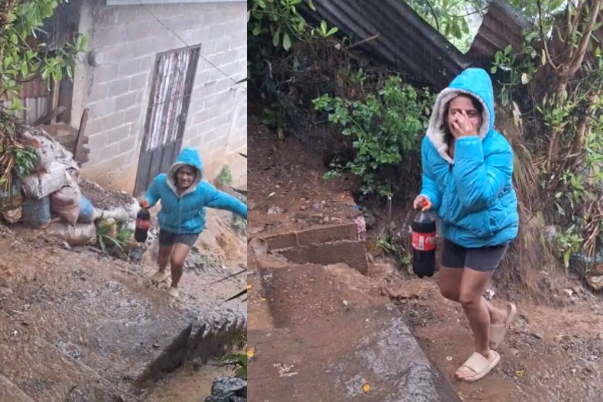 ¡No puede faltar el refresco! Mujer se viraliza por ir por una Coca-Cola de 2 litros bajo la lluvia | VIDEO