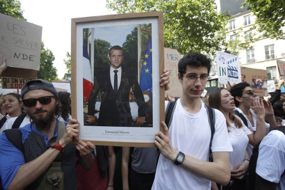 Activistas enfrentan cárcel por quitar retratos de Macron