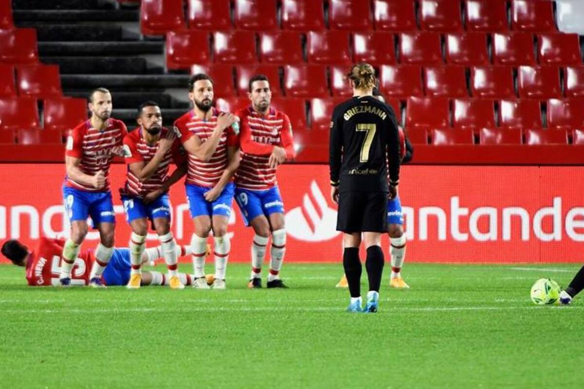 Doblete de golazos de Messi en triunfo del Barcelona sobre Granada