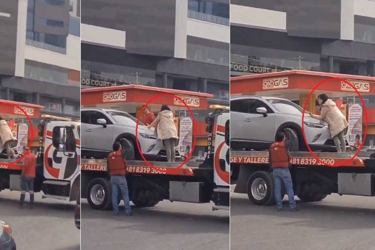 VIDEO: Mujer sube a una grúa para impedir que se llevara su camioneta