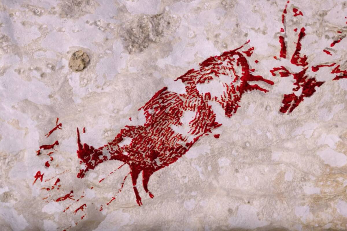 Descubren en Indonesia la pintura rupestre de caza más antigua del mundo