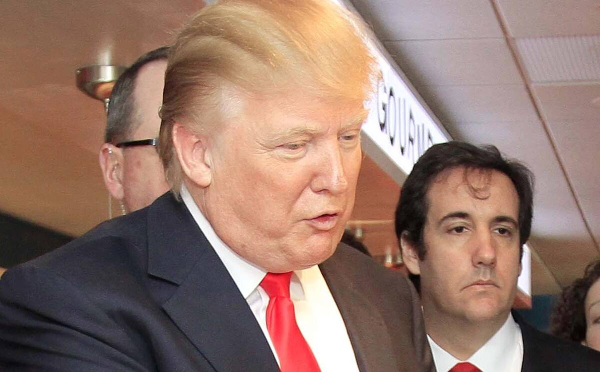 Donald Trump (i) y su exabogado Michael Cohen (d), en una fotografía de archivo. | Crédito: AP
